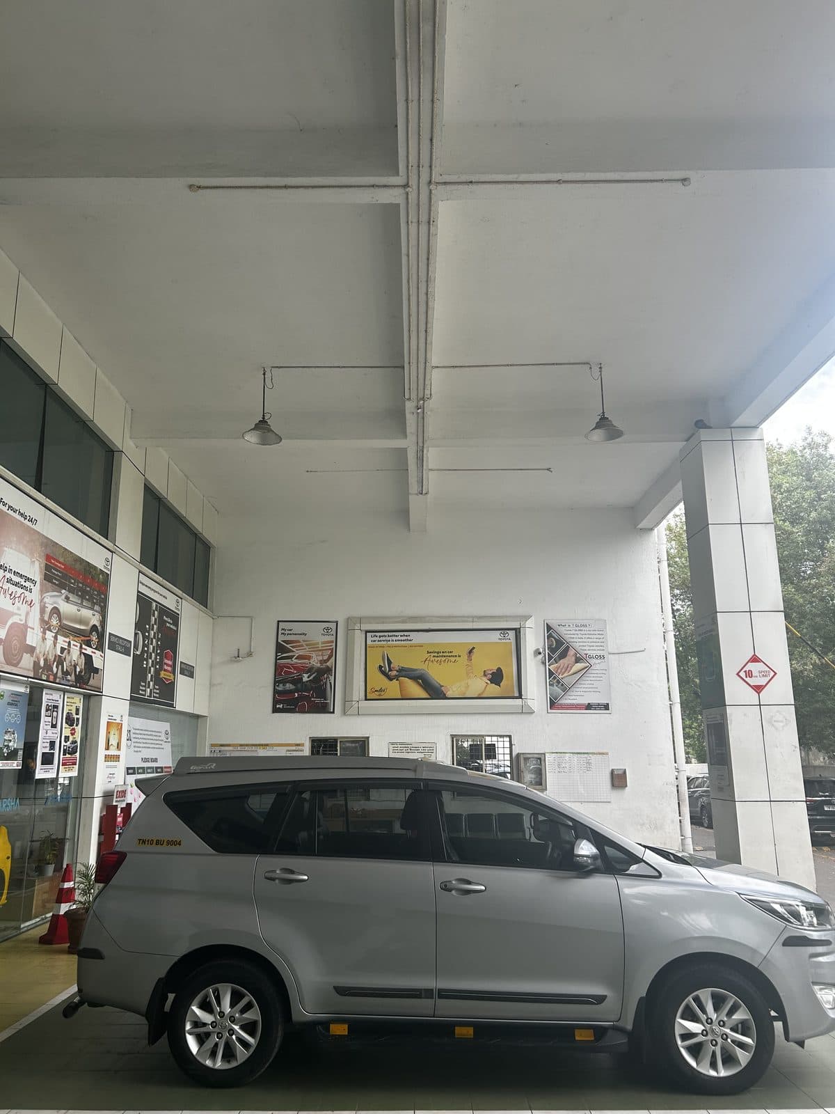 Innova Crysta taxi side profile — chauffeur-driven cab in Chennai